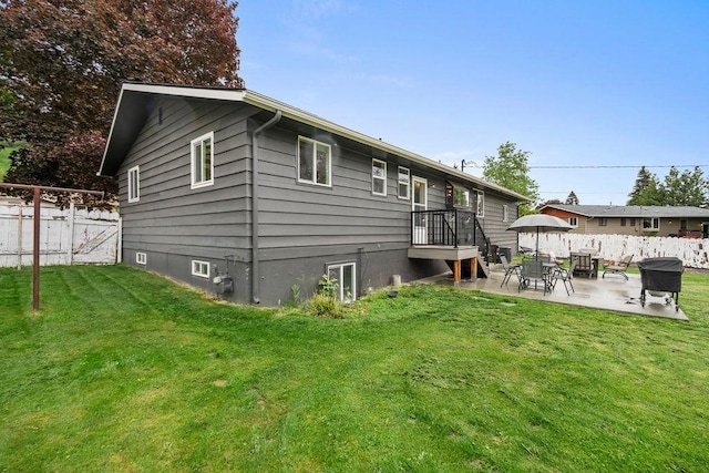 8214 N Jefferson Dr, Spokane, WA 99208 - back of property with a patio area