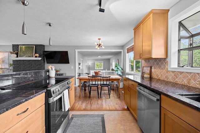8214 N Jefferson Dr, Spokane, WA 99208 - kitchen with dishwasher, electric range, healthy amount of natural light, and tasteful backsplash