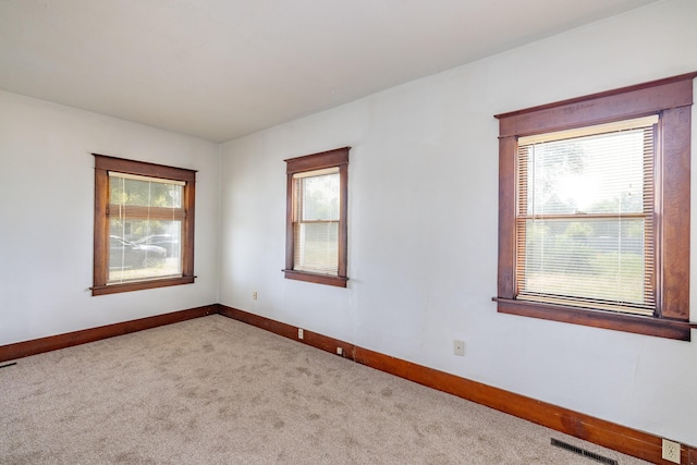 33 E Everett Ave, Spokane, WA 99207 - unfurnished room featuring carpet flooring and baseboards
