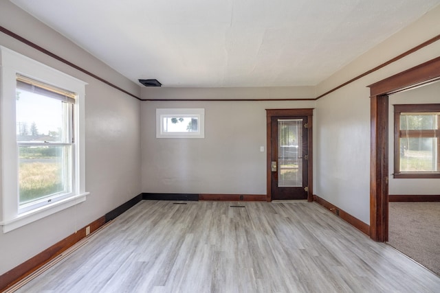 33 E Everett Ave, Spokane, WA 99207 - empty room featuring baseboards and light wood-style floors