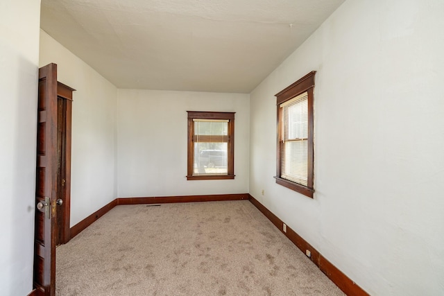 33 E Everett Ave, Spokane, WA 99207 - carpeted empty room with baseboards