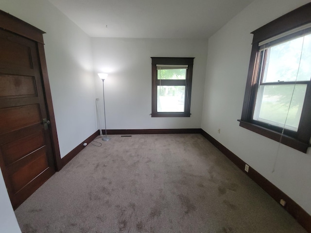 33 E Everett Ave, Spokane, WA 99207 - empty room featuring carpet floors and baseboards