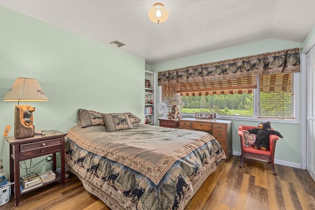 2443 Flowery Trail Rd, Usk, WA 99180 - bedroom with wood finished floors, lofted ceiling, and baseboards