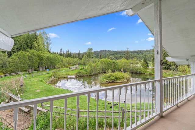 2443 Flowery Trail Rd, Usk, WA 99180 - balcony with a water view and a forest view