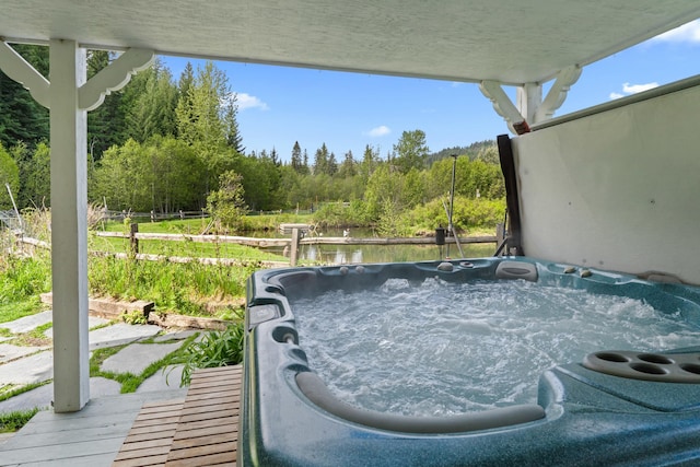 2443 Flowery Trail Rd, Usk, WA 99180 - exterior view of a hot tub and a forest view