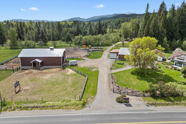 2443 Flowery Trail Rd, Usk, WA 99180 - view of subject property with a heavily wooded area and mountains