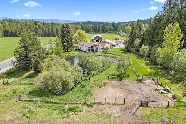 2443 Flowery Trail Rd, Usk, WA 99180 - view of subject property with a nearby body of water and a heavily wooded area