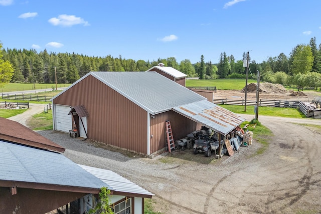 2443 Flowery Trail Rd, Usk, WA 99180 - view of pole building featuring fence and a wooded view