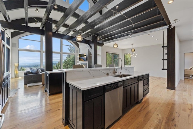 2503 S Thierman Ln, Spokane, WA 99223 - kitchen with open floor plan, dishwasher, a sink, a kitchen island with sink, and recessed lighting