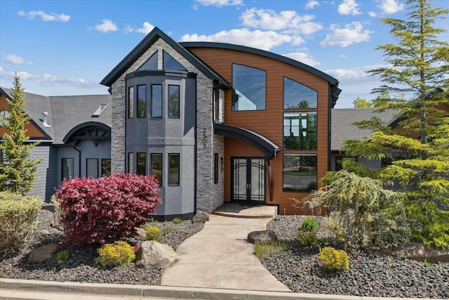 2503 S Thierman Ln, Spokane, WA 99223 - contemporary house with french doors, stone siding, and stucco siding