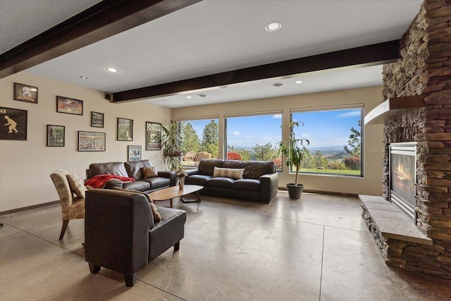2503 S Thierman Ln, Spokane, WA 99223 - living room featuring beamed ceiling, baseboards, finished concrete flooring, recessed lighting, and a stone fireplace