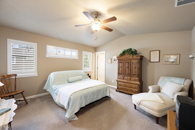 9016 N Sundance Dr, Spokane, WA 99208 - carpeted bedroom featuring baseboards, vaulted ceiling, and ceiling fan