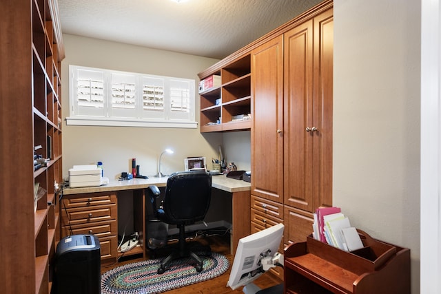9016 N Sundance Dr, Spokane, WA 99208 - office featuring built in desk and wood finished floors