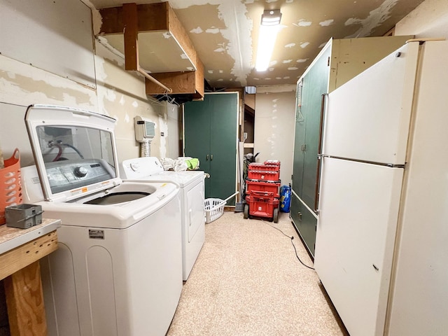 laundry area with separate washer and dryer