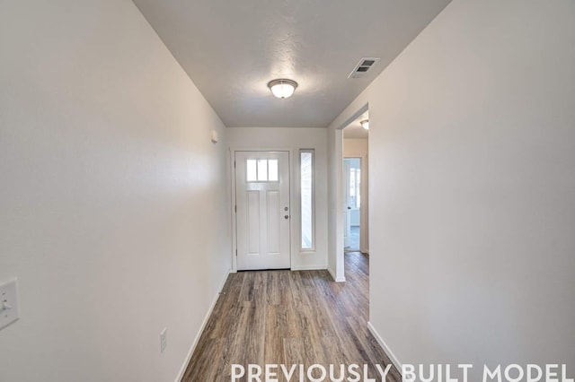 18806 E Riverside Ct, Spokane Valley, WA 99016 - entrance foyer with wood finished floors and baseboards