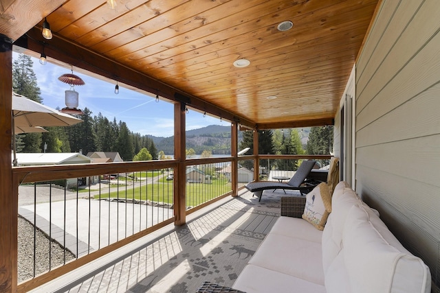 29955 N Isle View Rd, Spirit Lake, ID 83869 - wooden deck with a mountain view and an outdoor living space
