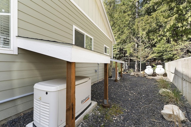 29955 N Isle View Rd, Spirit Lake, ID 83869 - view of side of property featuring fence and board and batten siding