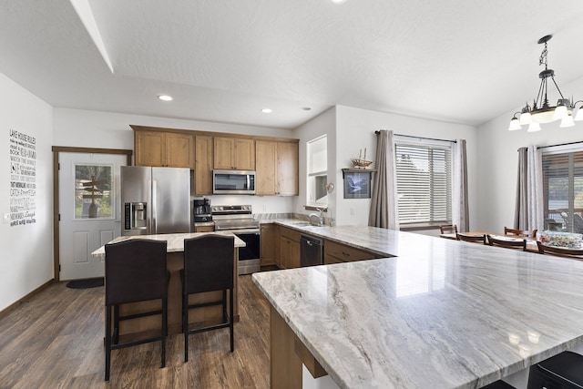 29955 N Isle View Rd, Spirit Lake, ID 83869 - kitchen featuring stainless steel appliances, a sink, dark wood-style floors, recessed lighting, and a peninsula