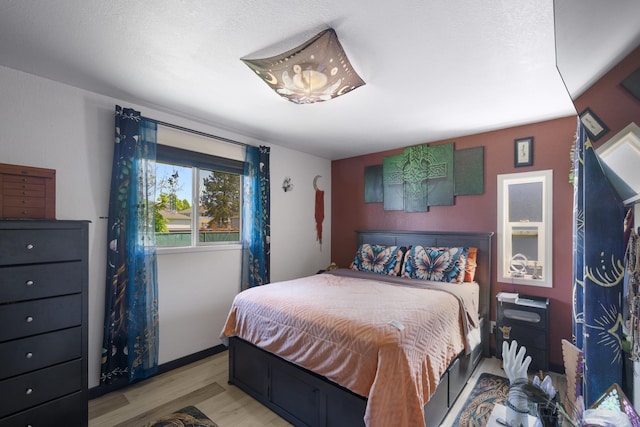 1503 E 3rd Ave, Post Falls, ID 83854 - bedroom with light wood finished floors