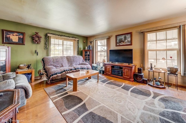 203 N Mcdonald Rd, Spokane, WA 99216 - living room featuring light wood-style flooring and baseboards