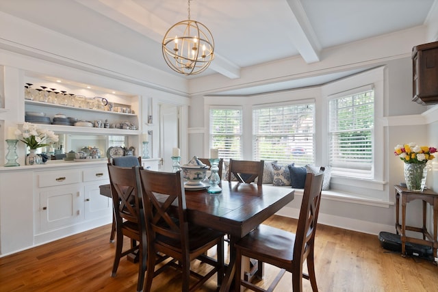 dining area with a chandelier, plenty of natural light, beamed ceiling, and light wood-style flooring
