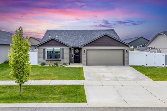 18924 E Fredrick Ave, Otis Orchards, WA 99027 - ranch-style house with an attached garage, driveway, a gate, and roof with shingles
