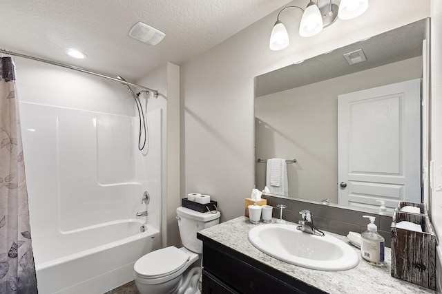 18924 E Fredrick Ave, Otis Orchards, WA 99027 - full bath with toilet, vanity, shower / tub combo with curtain, and a textured ceiling