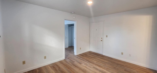1618 N Lincoln St, Spokane, WA 99205 - empty room featuring baseboards and wood finished floors