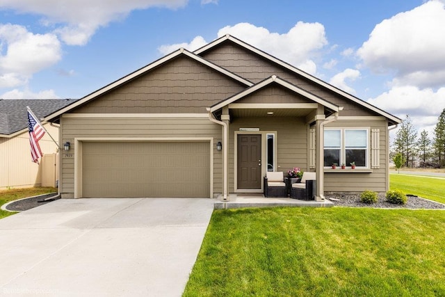 7919 W 55th Ave, Spokane, WA 99224 - view of front facade with an attached garage, concrete driveway, and a front yard