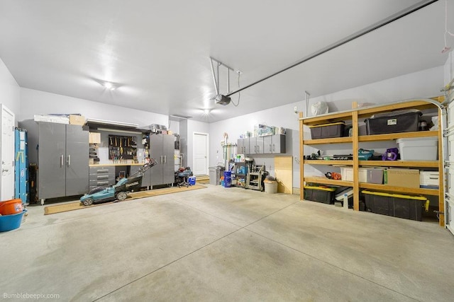 7919 W 55th Ave, Spokane, WA 99224 - garage featuring a garage door opener