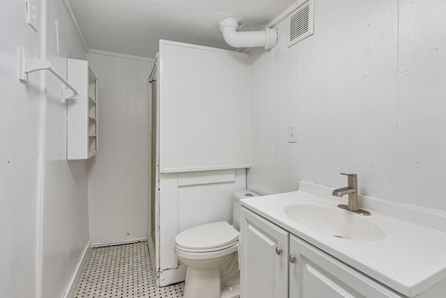 3013 E Broad Ave, Spokane, WA 99217 - bathroom featuring tile patterned floors, vanity, toilet, and a shower