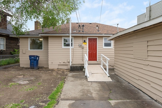3013 E Broad Ave, Spokane, WA 99217 - back of property featuring a chimney and roof with shingles