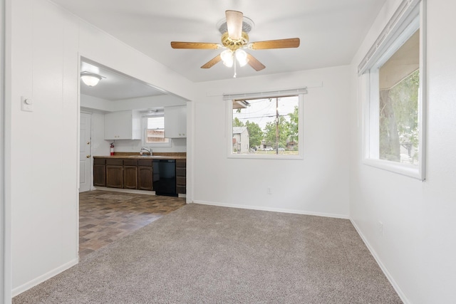 3013 E Broad Ave, Spokane, WA 99217 - unfurnished living room with a ceiling fan, carpet, and baseboards