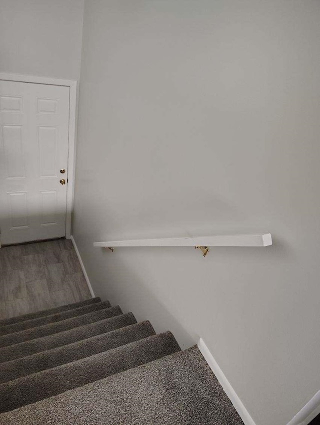 507 E Longfellow Ave, Spokane, WA 99207 - stairs featuring baseboards