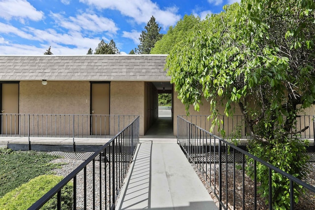 5303 N Argonne Ln Unit 13, Spokane, WA 99212 - entrance to property featuring roof with shingles and stucco siding