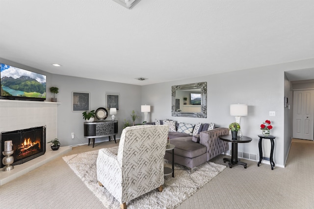 5303 N Argonne Ln Unit 13, Spokane, WA 99212 - carpeted living area with a fireplace and baseboards
