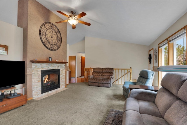 10610 N Iroquois Dr, Spokane, WA 99208 - living area featuring a ceiling fan, carpet flooring, vaulted ceiling, and a fireplace