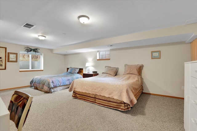 10610 N Iroquois Dr, Spokane, WA 99208 - bedroom with carpet flooring, multiple windows, and baseboards