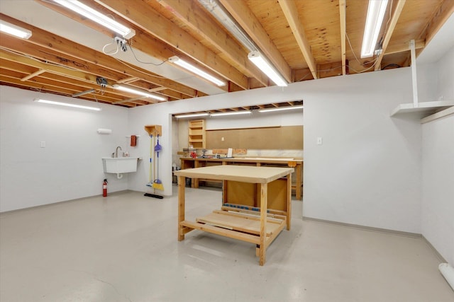10610 N Iroquois Dr, Spokane, WA 99208 - basement featuring a workshop area and a sink