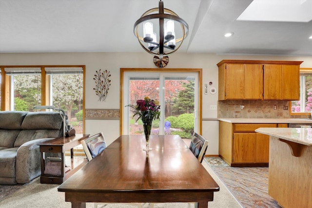 10610 N Iroquois Dr, Spokane, WA 99208 - dining area featuring plenty of natural light, a chandelier, recessed lighting, and light carpet