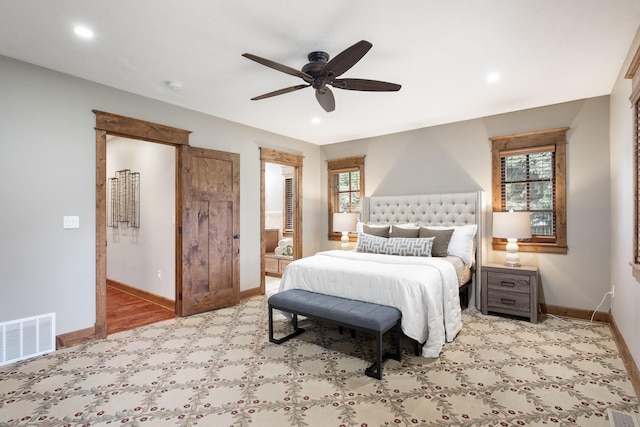 10204 N Wellen Ln, Spokane, WA 99218 - bedroom with baseboards, multiple windows, recessed lighting, a ceiling fan, and wood finished floors