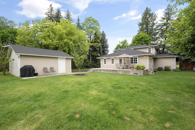 10204 N Wellen Ln, Spokane, WA 99218 - view of yard with a patio area and an outdoor structure