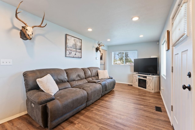 4521 E Fairview St, Spokane, WA 99217 - living area with wood finished floors, baseboards, and recessed lighting