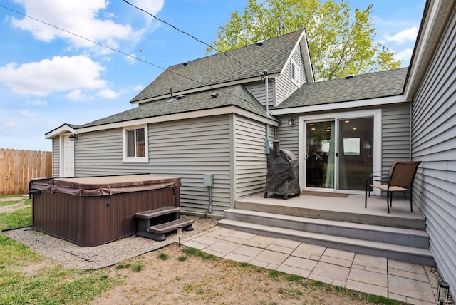 4521 E Fairview St, Spokane, WA 99217 - rear view of house featuring a hot tub and roof with shingles