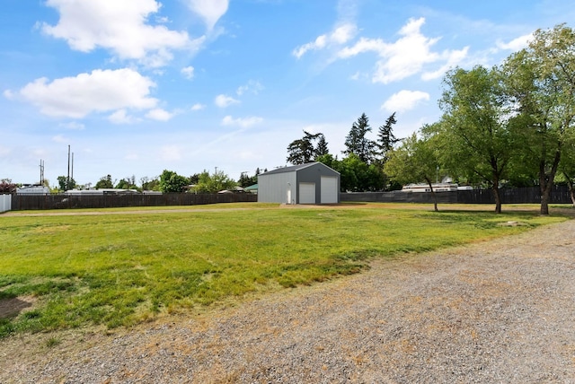4521 E Fairview St, Spokane, WA 99217 - view of yard featuring a detached garage and an outbuilding