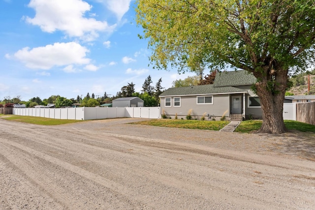 4521 E Fairview St, Spokane, WA 99217 - view of front of home featuring driveway and a shingled roof
