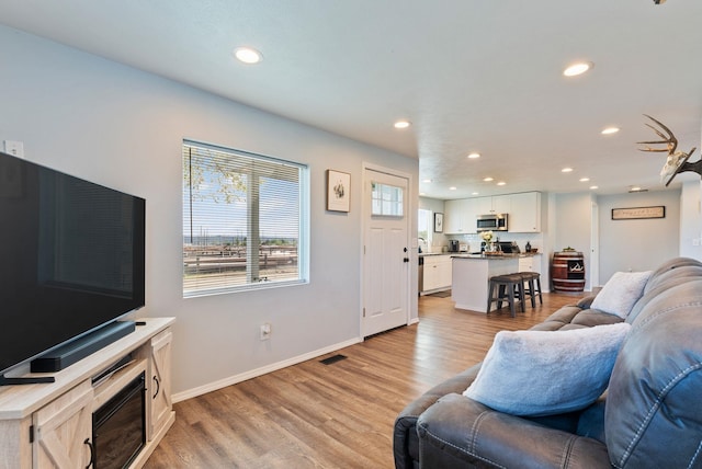 4521 E Fairview St, Spokane, WA 99217 - living room with recessed lighting, light wood finished floors, and baseboards