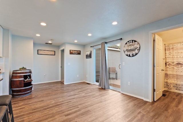 4521 E Fairview St, Spokane, WA 99217 - living area featuring wood finished floors, baseboards, and recessed lighting