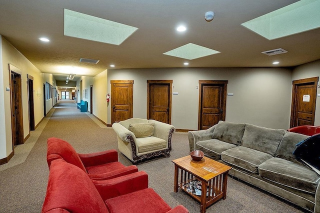 6701 N Idaho Rd, Newman Lake, WA 99025 - living room with a skylight, light colored carpet, recessed lighting, and baseboards