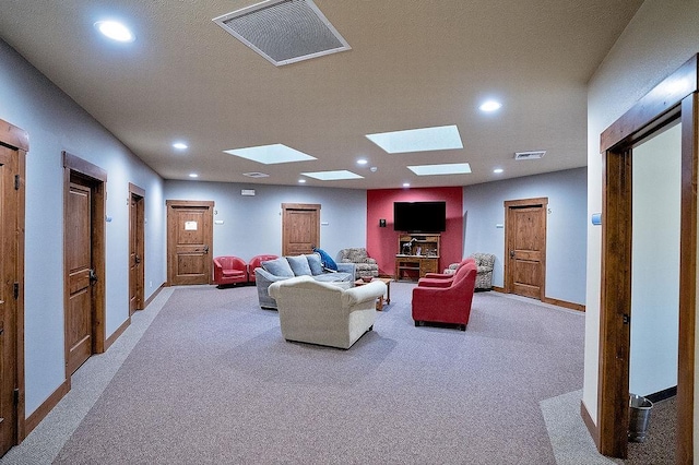6701 N Idaho Rd, Newman Lake, WA 99025 - living room with a skylight, light colored carpet, recessed lighting, and baseboards